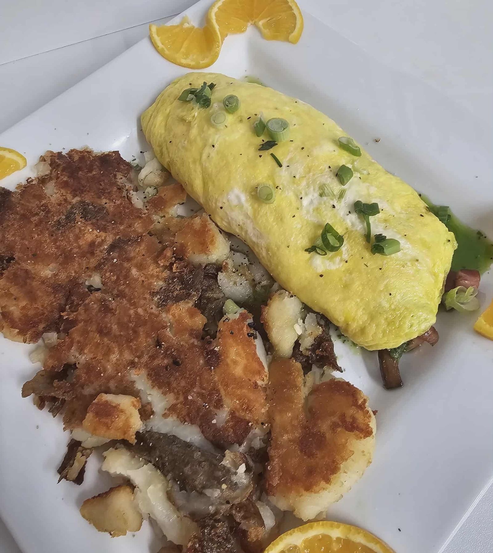 Omelette with crispy potatoes, breakfast at The Pink Elephant